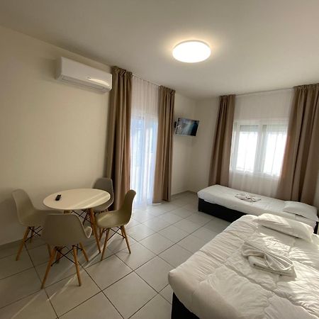 פוטוס Opalium Beach Front Suites מראה חיצוני תמונה