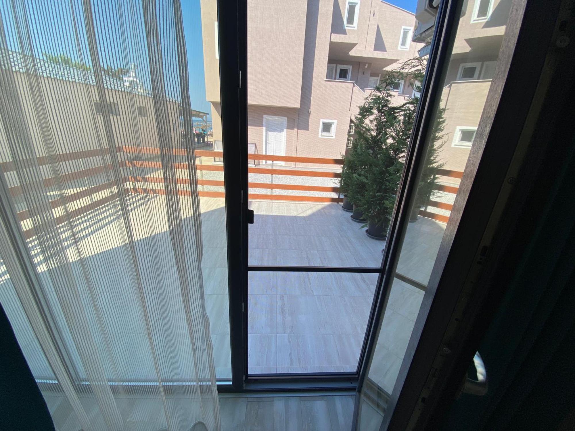 פוטוס Opalium Beach Front Suites מראה חיצוני תמונה