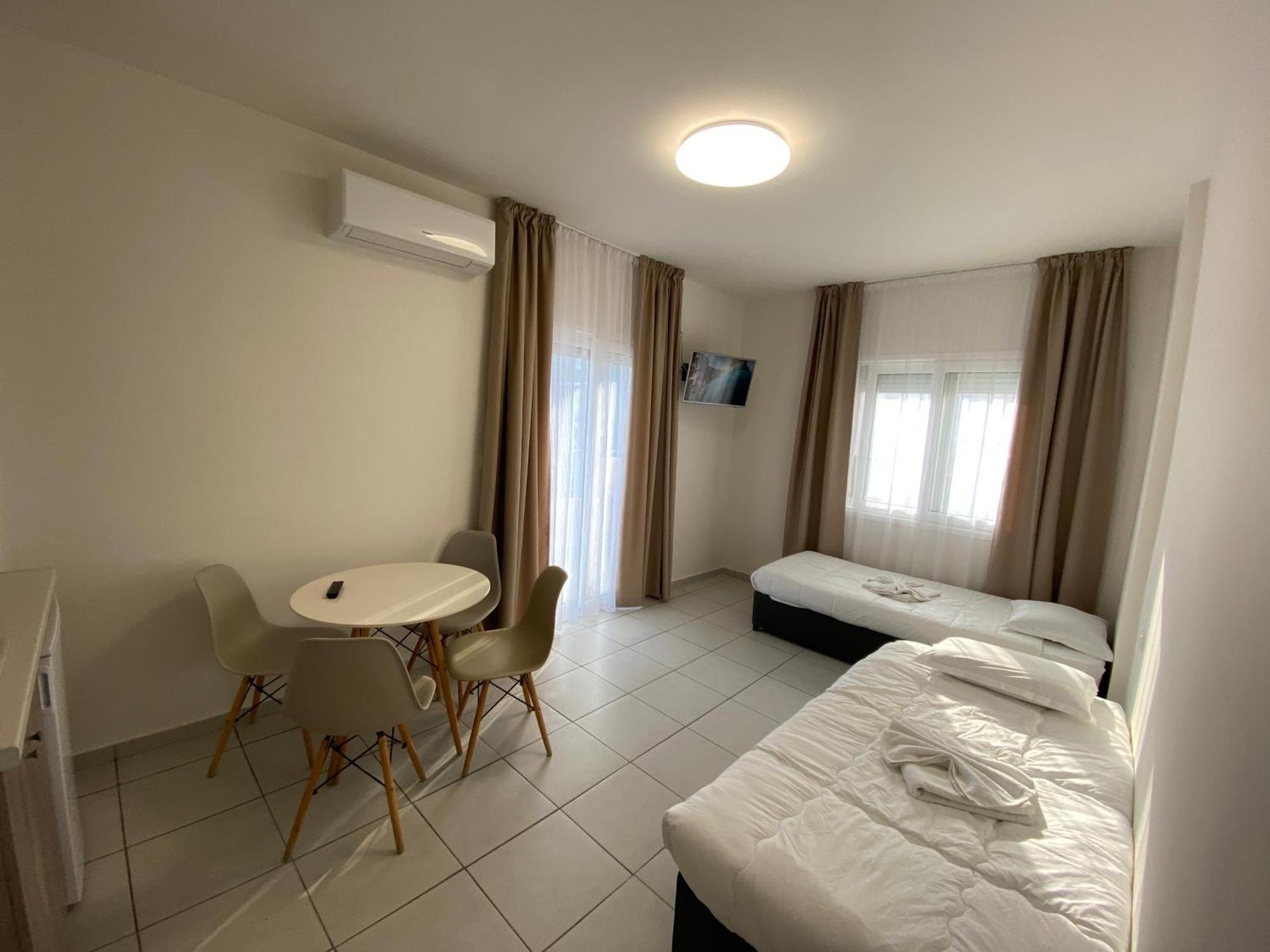 פוטוס Opalium Beach Front Suites מראה חיצוני תמונה