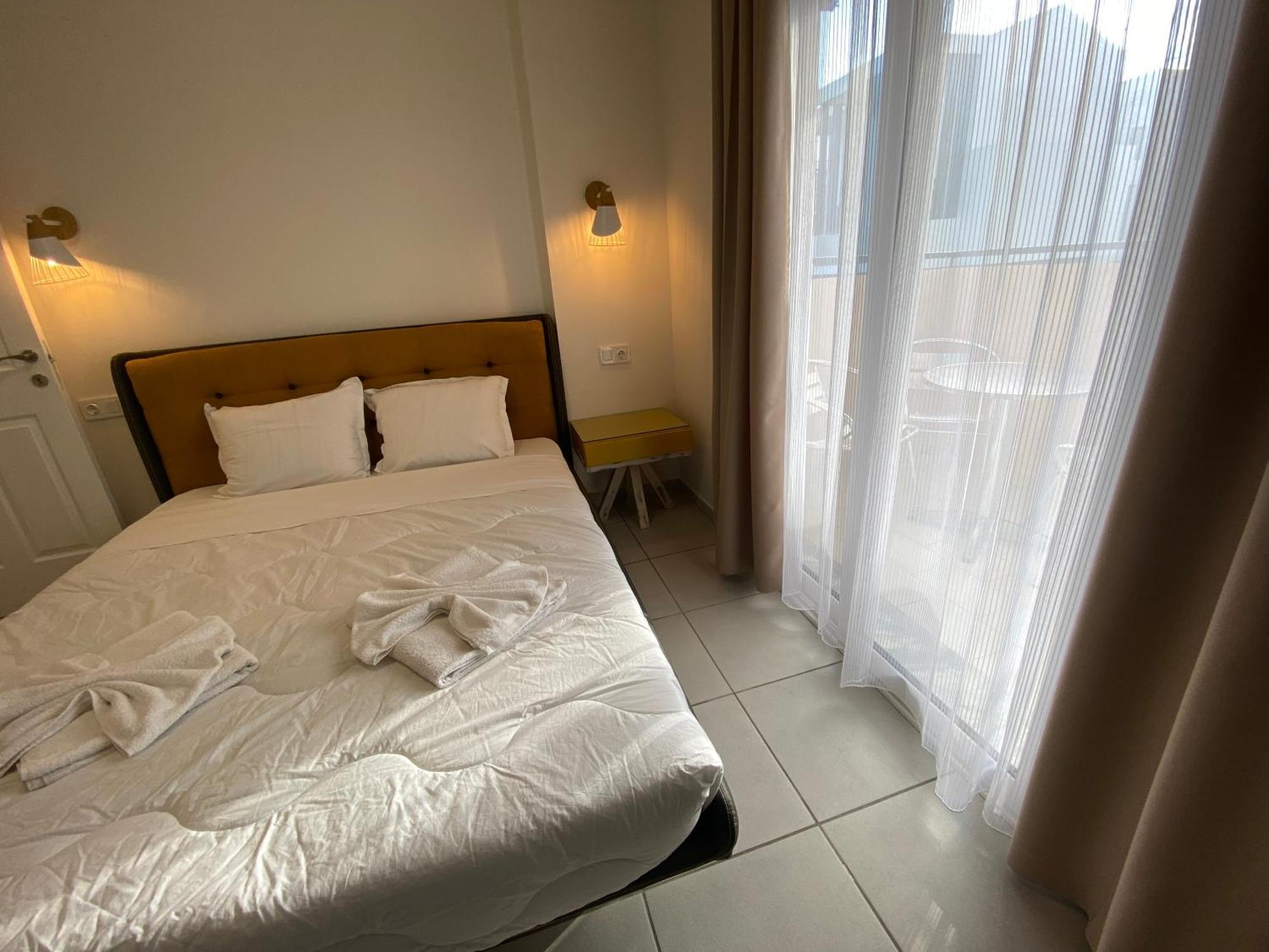 פוטוס Opalium Beach Front Suites מראה חיצוני תמונה